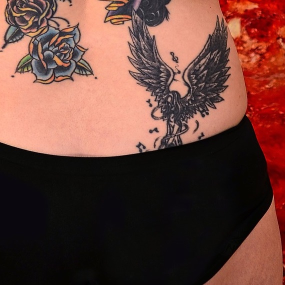 Female back tattoos can be anything from a “tramp stamp” on the lower back,  to something small scattered on any part of the back, to a large back piece  covering the entire